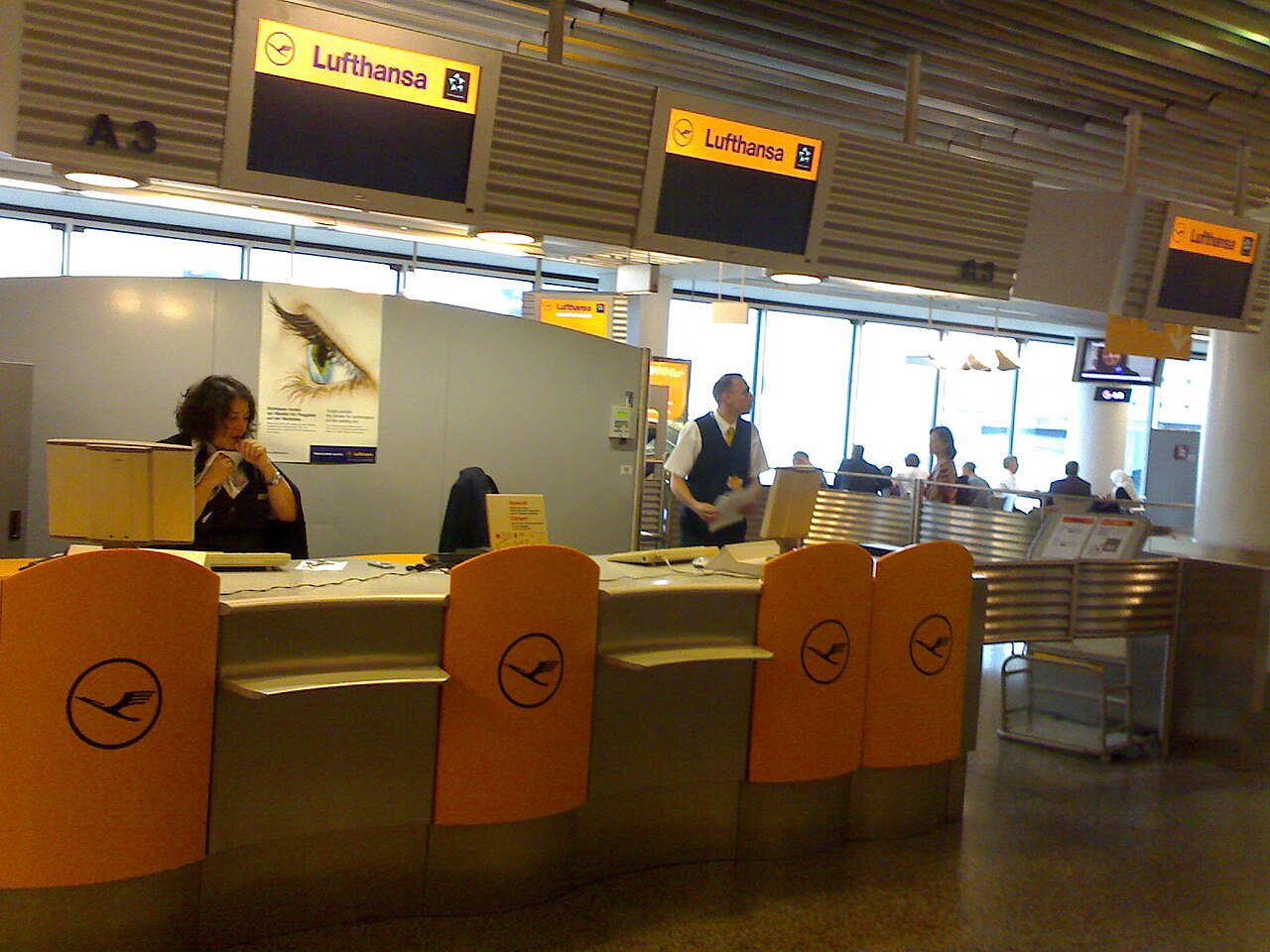 Check-in counters and displays at Frankfurt Airport.